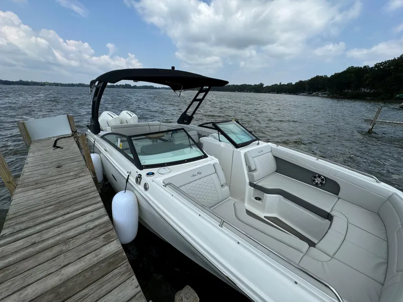 Slide: The Image of Simrad display on 2023 Sea Ray SDX 290 Outboard showing speed and RPM gauges. - 4