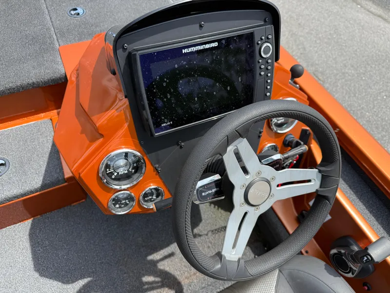 Slide: The Image of 2020 Vexus AVX 1980 boat dashboard with Humminbird display and steering wheel. - 11
