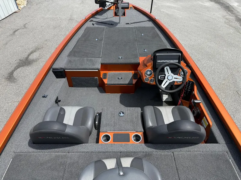 Slide: The Image of 2020 Vexus AVX 1980 boat interior with steering console and seating, featuring Humminbird electronics. - 9