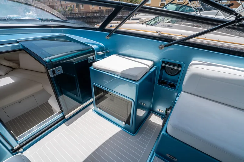 Slide: The Image of 2018 VanDutch 30 yacht interior with sleek blue design and comfortable seating. - 21