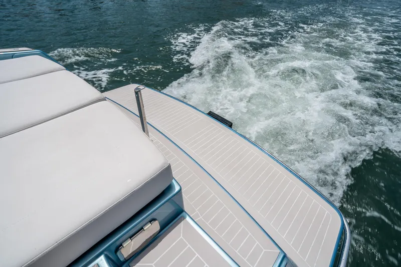 Slide: The Image of VanDutch 30 yacht, 2018 model, cruising on water with sleek deck design. - 9