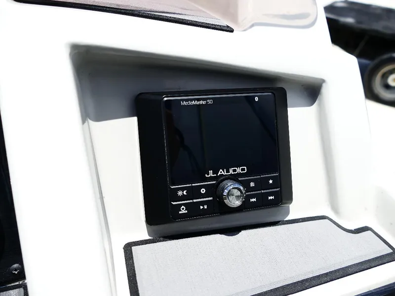 Slide: The Image of JL Audio MediaMaster 50 on 2021 Starcraft SVX 211 OB boat dashboard. - 14