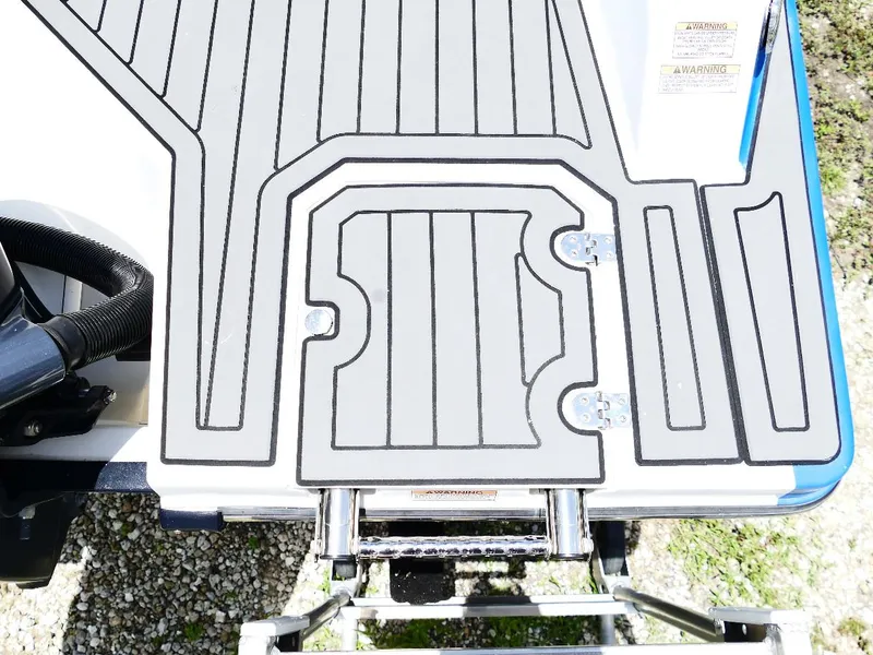 Slide: The Image of 2021 Starcraft SVX 211 OB boat deck with non-slip surface and ladder. - 20