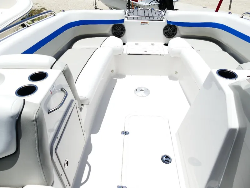 Slide: The Image of 2021 Starcraft SVX 211 OB boat interior with seating and cup holders. - 35