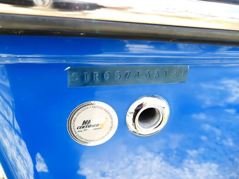 Slide: The Image of 2021 Starcraft SVX 211 OB boat hull identification number and certification label. - 36
