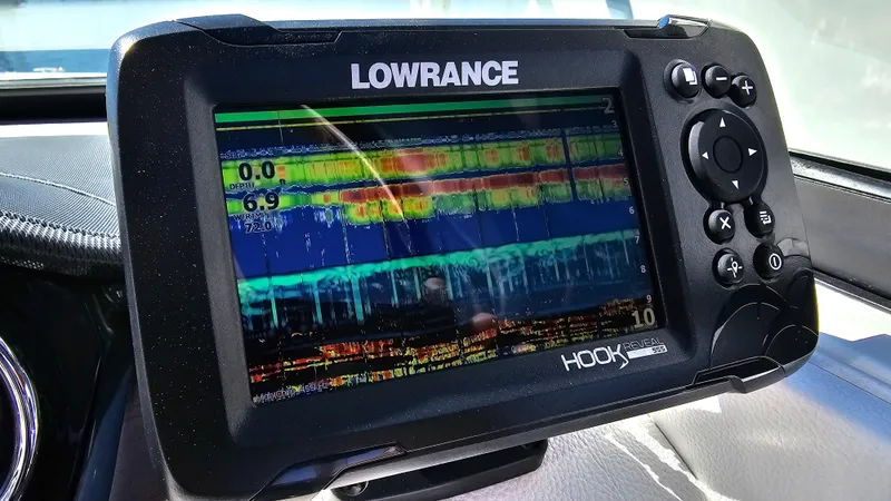 Slide: The Image of Lowrance fish finder display on 2016 Sea Ray 230 SLX boat dashboard. - 30