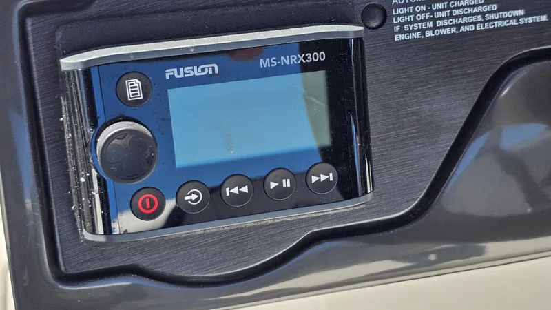 Slide: The Image of Fusion MS-NRX300 marine stereo on 2016 Sea Ray 230 SLX dashboard. - 31
