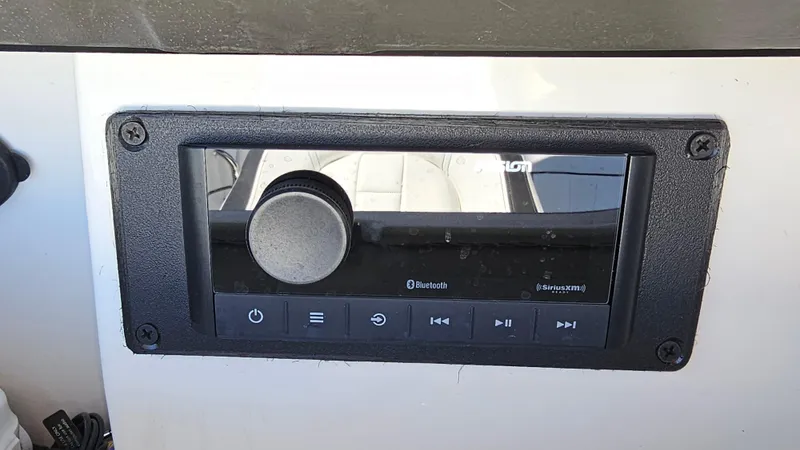 Slide: The Image of 2016 Sea Ray 230 SLX boat stereo system with Bluetooth connectivity. - 32