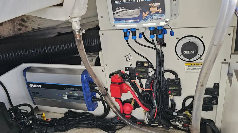 Slide: The Image of Electrical system of a 2016 Sea Ray 230 SLX boat, featuring wiring and components. - 34