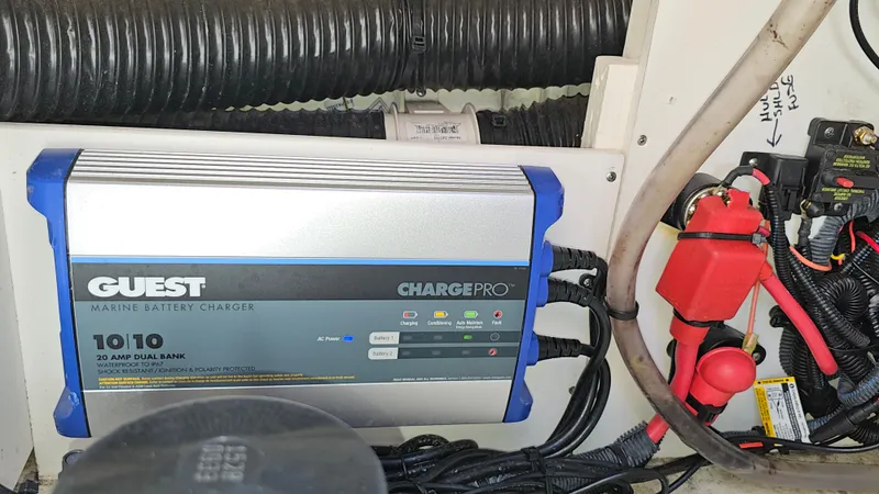 Slide: The Image of Marine battery charger in a 2016 Sea Ray 230 SLX boat engine compartment. - 35