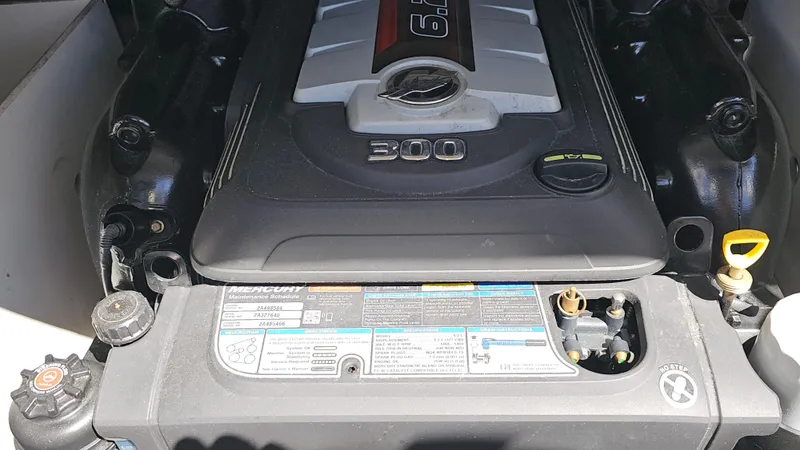 Slide: The Image of Engine of a 2016 Sea Ray 230 SLX boat, showcasing the 300 horsepower motor. - 39