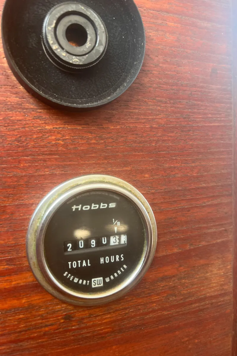Slide: The Image of Hobbs hour meter on 1986 Cape Dory 28 Pilot House, showing 209 hours. - 46