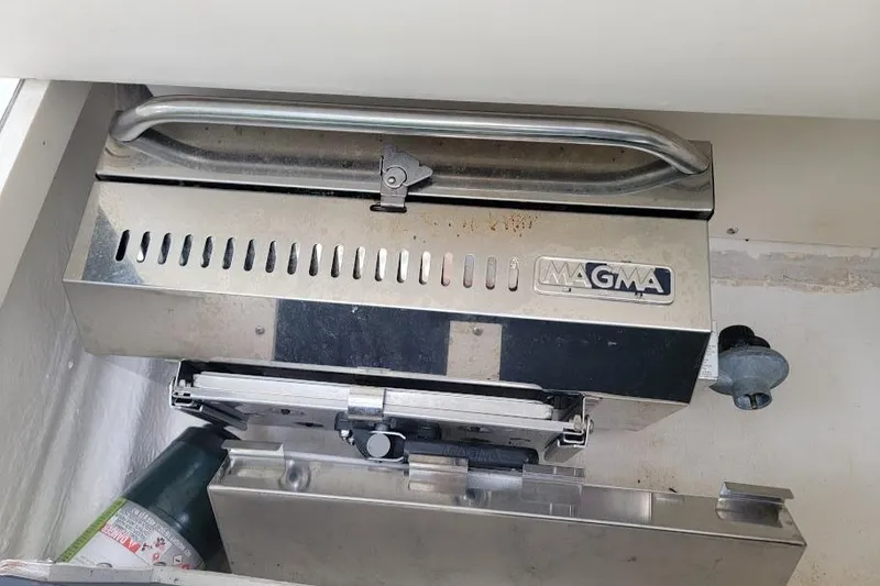 Slide: The Image of Stainless steel Magma grill on Tiara Yachts 3100 Open, 1995 model. - 23