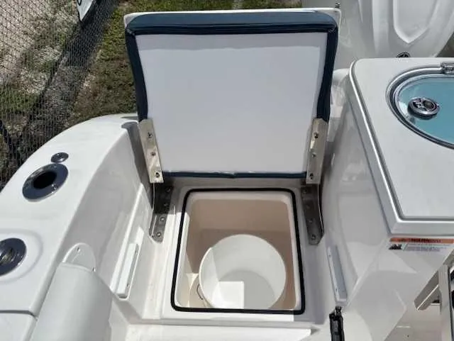 Slide: The Image of Open storage compartment on 2025 Sea Fox 328 Commander boat. - 20