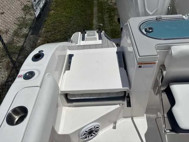 Slide: The Image of 2025 Sea Fox 328 Commander boat deck with seating and storage features. - 21