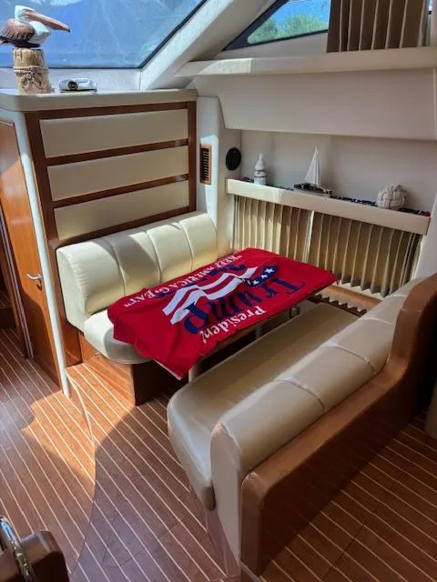 Slide: The Image of Interior of 2006 Carver 43 Motor Yacht with cozy seating and decorative elements. - 30