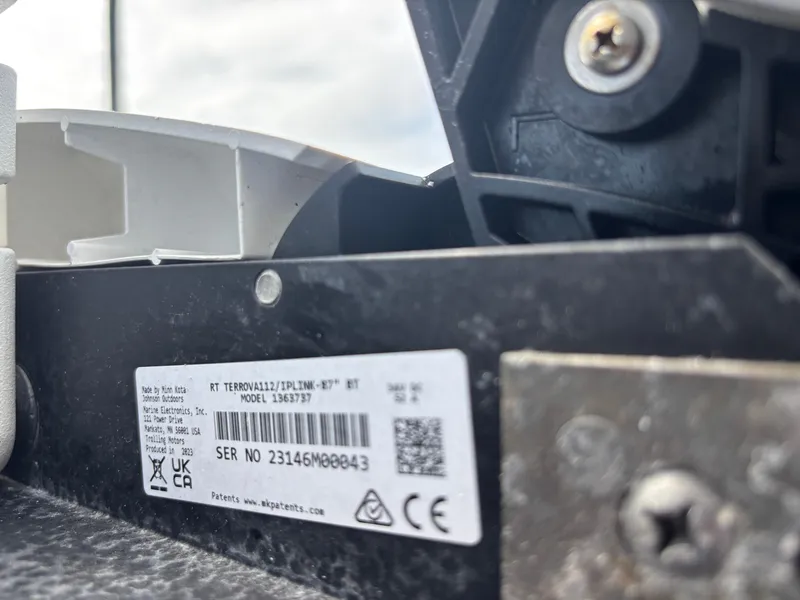 Slide: The Image of Close-up of a Minn Kota motor label on a 2003 KenCraft 235 Challenger boat. - 11