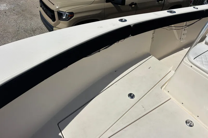 Slide: The Image of 2003 KenCraft 235 Challenger boat interior with seating and deck details. - 35