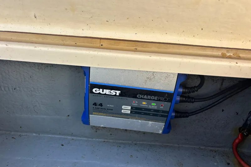 Slide: The Image of Marine battery charger in a 2003 KenCraft 235 Challenger boat. - 65