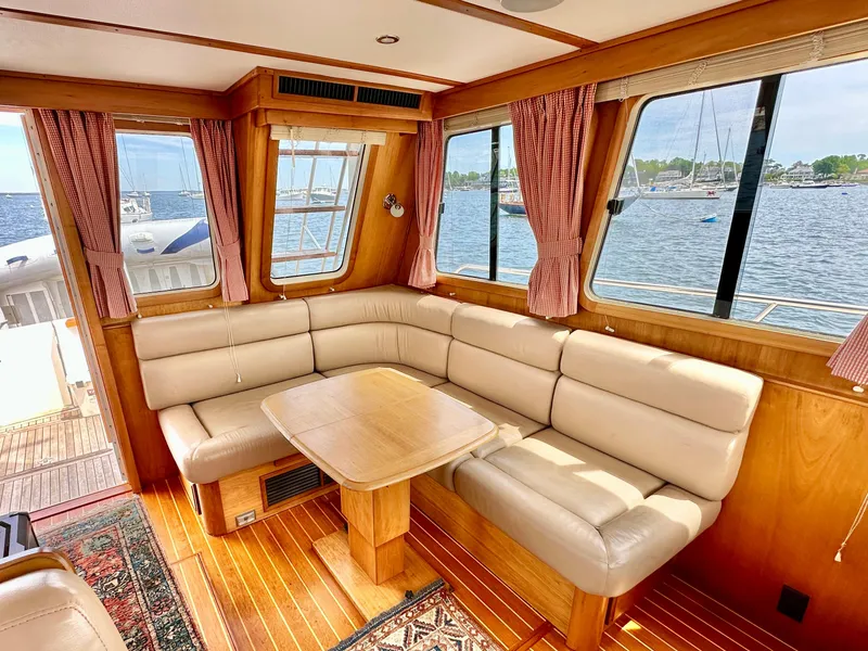 Slide: The Image of Luxurious interior of 2002 Sabreline 36 Flybridge yacht with scenic water views. - 8