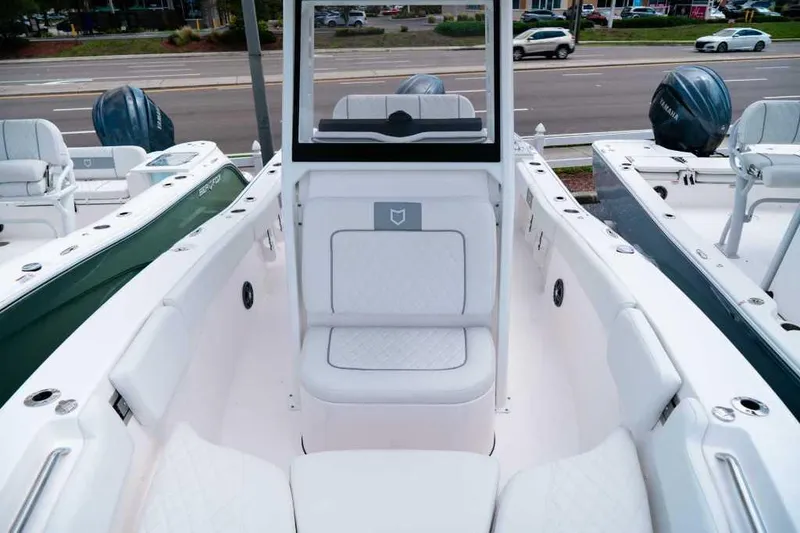 Slide: The Image of 2025 Sea Fox 228 Commander boat interior with white seating and modern design. - 15