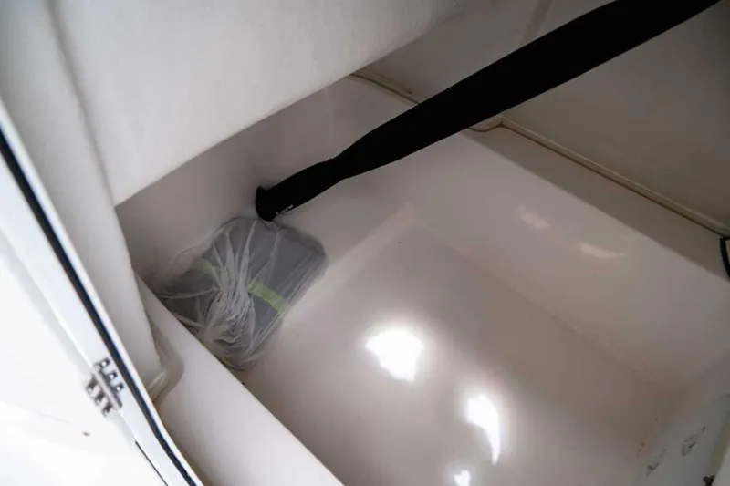 Slide: The Image of Storage compartment in 2025 Sea Fox 228 Commander boat, featuring a clean interior. - 17