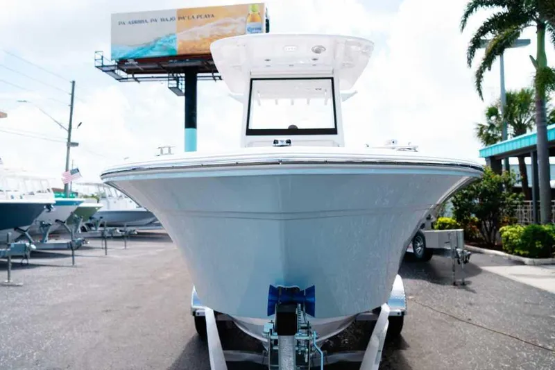 Slide: The Image of 2025 Sea Fox 228 Commander boat on trailer, displayed outdoors. - 2