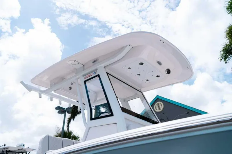 Slide: The Image of 2025 Sea Fox 228 Commander boat, showcasing sleek design under a bright sky. - 3