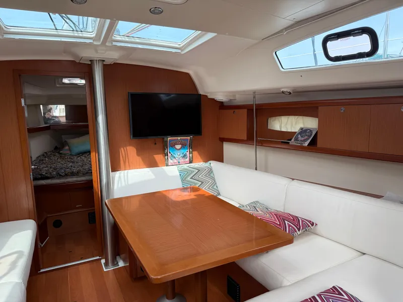 Slide: The Image of Interior of 2008 Beneteau Oceanis 40 yacht with cozy seating and modern amenities. - 3