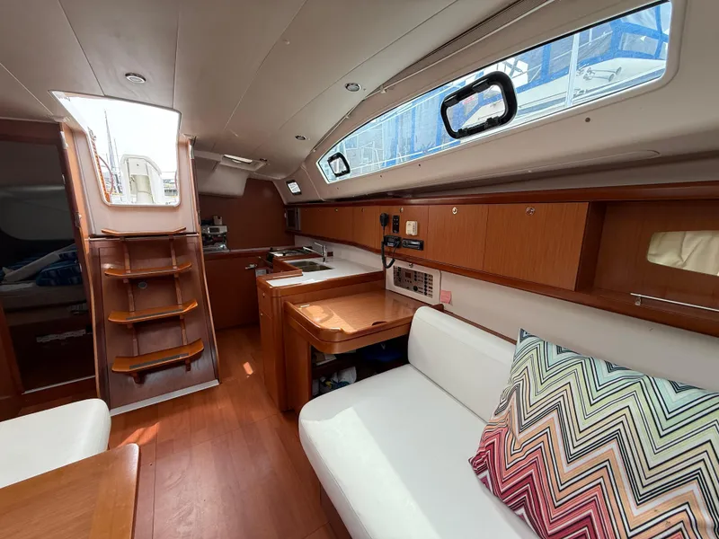 Slide: The Image of Interior of 2008 Beneteau Oceanis 40 sailboat with wood finish and modern amenities. - 39