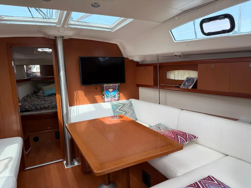 Slide: The Image of Interior of 2008 Beneteau Oceanis 40 yacht with cozy seating and modern amenities. - 4