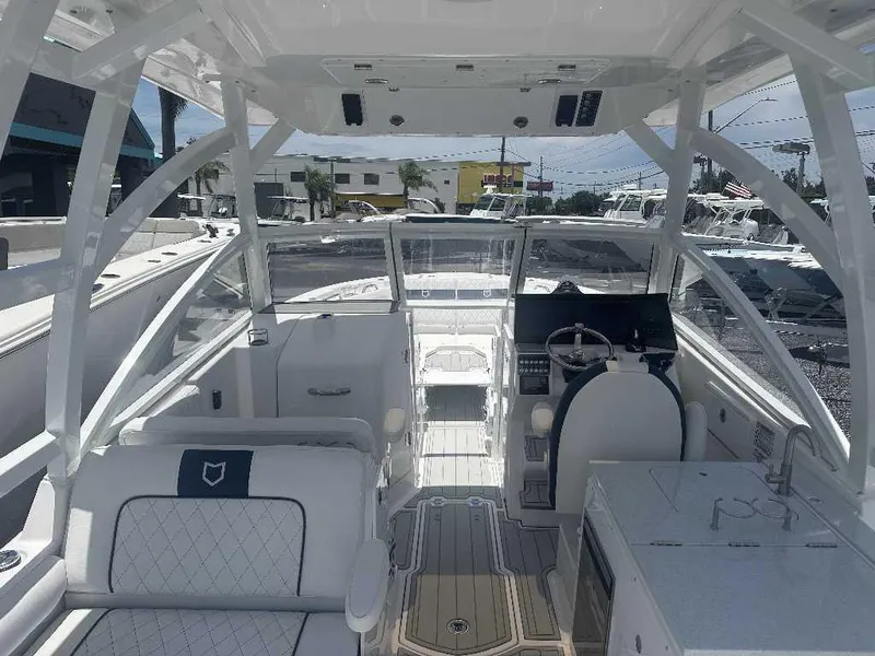 Slide: The Image of 2026 Sea Fox 288 Traveler boat interior with helm, seating, and modern amenities. - 3