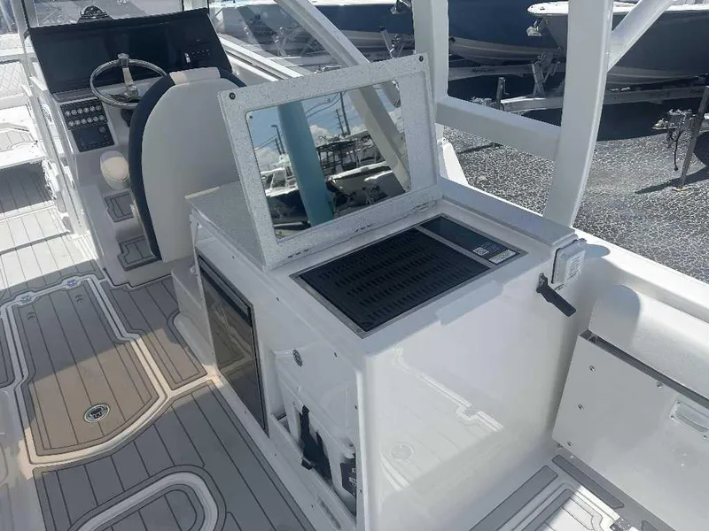 Slide: The Image of 2026 Sea Fox 288 Traveler boat interior with helm and seating area. - 5