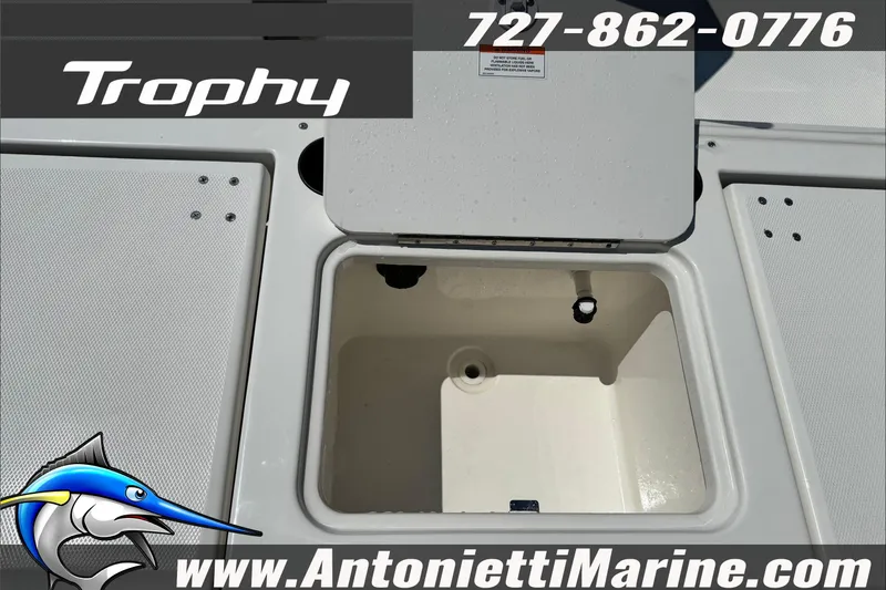 Slide: The Image of 2025 Trophy T20 CC boat storage compartment, Antonietti Marine logo, contact number displayed. - 12