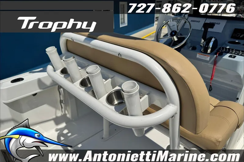 Slide: The Image of 2025 Trophy T20 CC boat interior with rod holders and steering console, Antonietti Marine branding. - 13