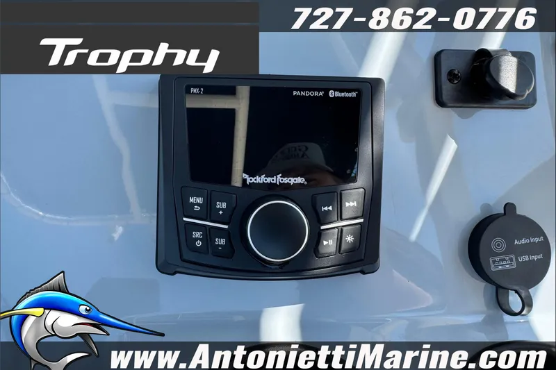 Slide: The Image of 2025 Trophy T20 CC audio system with Bluetooth and USB input, featuring Rockford Fosgate controls. - 17