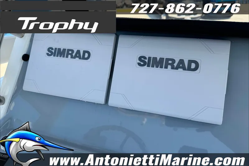 Slide: The Image of 2025 Trophy T20 CC boat dashboard with dual Simrad displays, Antonietti Marine branding. - 18