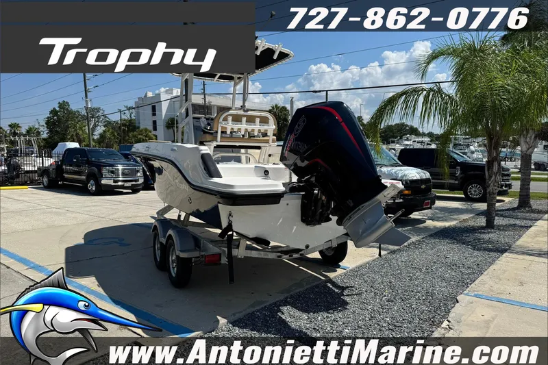 Slide: The Image of 2025 Trophy T20 CC boat on trailer at Antonietti Marine dealership. - 2