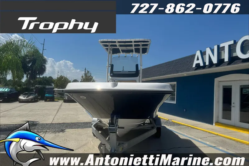 Slide: The Image of 2025 Trophy T20 CC boat at Antonietti Marine dealership, sunny day, contact number visible. - 30