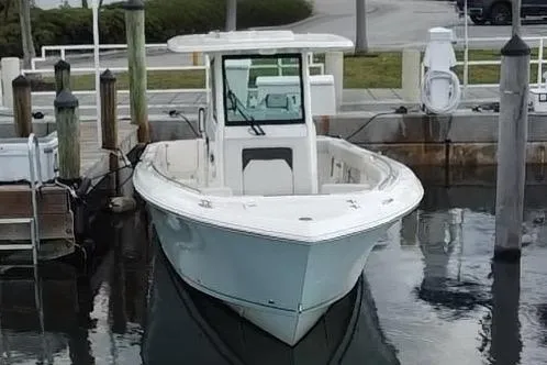 Slide: The Image of 2019 Sailfish 270 boat docked at marina, front view. - 3