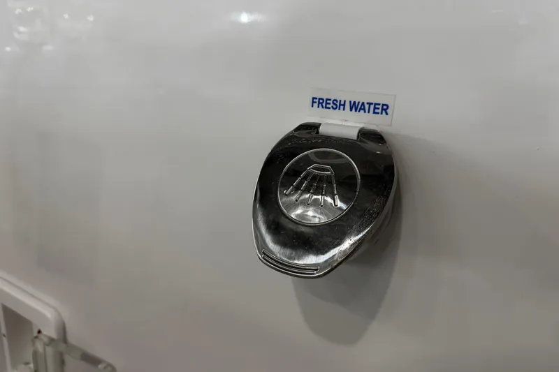 Slide: The Image of Speaker and interior details of 2026 Tidewater 256 CC Adventure boat. - 16