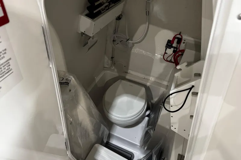 Slide: The Image of Fresh water access on 2026 Tidewater 256 CC Adventure boat. - 17