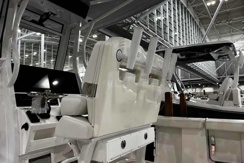 Slide: The Image of 2026 Tidewater 256 CC Adventure boat detail with Yamaha components and trim tab. - 8