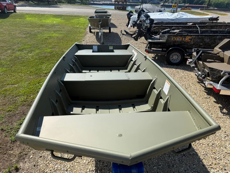 Slide: The Image of 2025 Lund 1440M boat on display, featuring a spacious interior and durable design. - 1