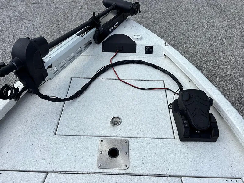Slide: The Image of 2022 Vexus AVX1980CC boat deck with Minn Kota trolling motor and foot pedal. - 13