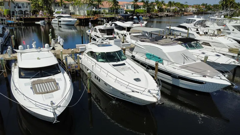 Slide: The Image of Luxury yachts docked at marina, featuring 2010 Sea Ray 540 Sundancer. - 1