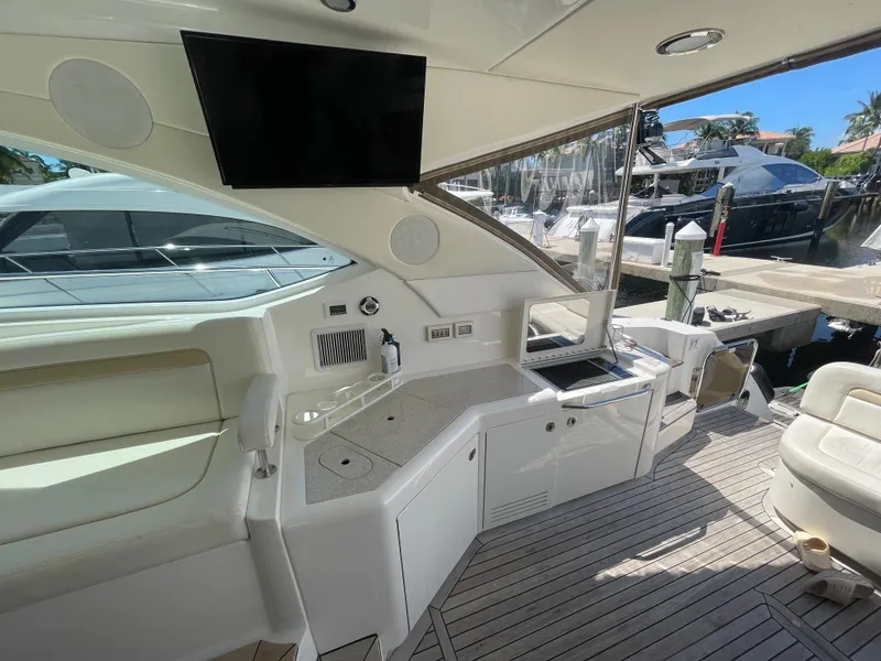 Slide: The Image of Luxurious 2010 Sea Ray 540 Sundancer yacht interior with modern amenities and sleek design. - 17