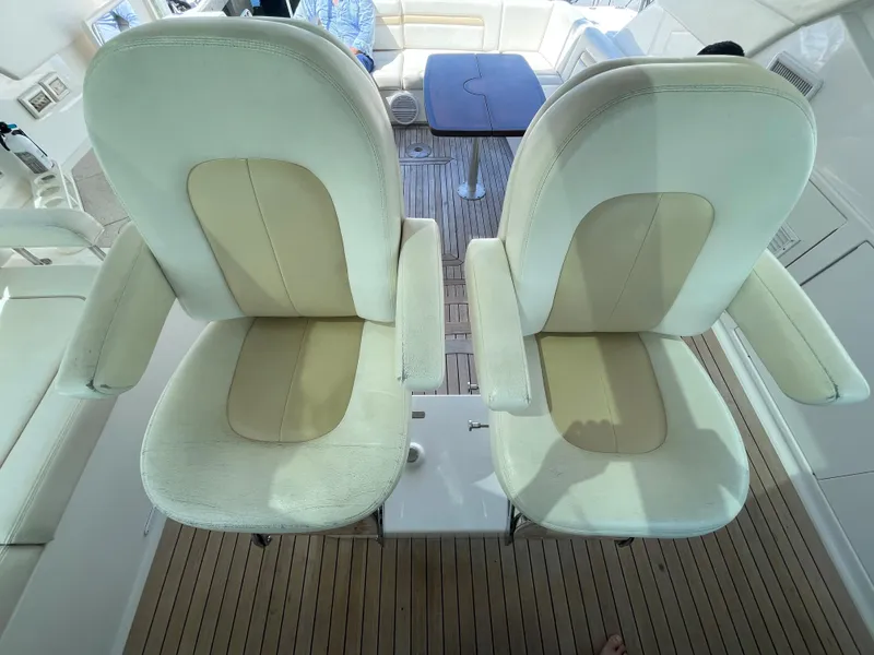 Slide: The Image of Two cream-colored seats on a 2010 Sea Ray 540 Sundancer yacht. - 22