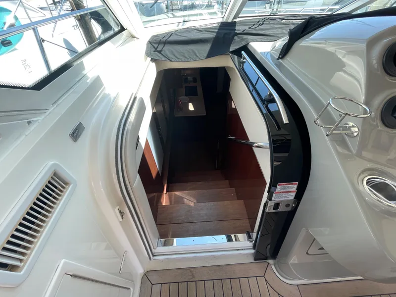 Slide: The Image of Interior view of 2010 Sea Ray 540 Sundancer yacht staircase. - 23