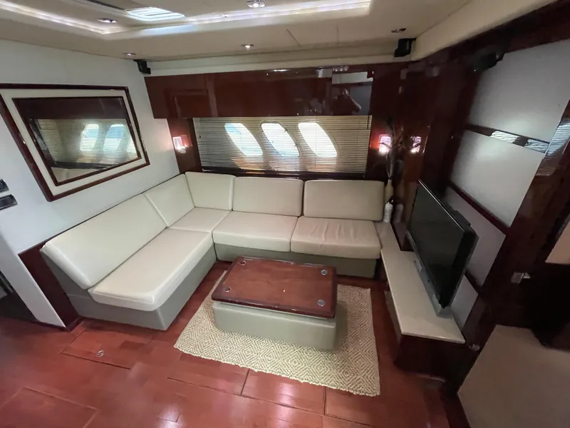 Slide: The Image of Luxurious interior of 2010 Sea Ray 540 Sundancer yacht with plush seating and modern decor. - 25